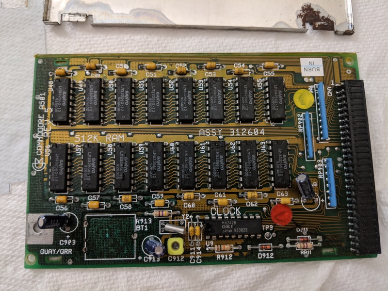 (Picture of a corroded Commodore Amiga A501 memory
                    expansion board, destroyed by battery leakage)